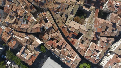 Old-mediterranean-city-rooftop-overhead-view-by-drone-aerial.-Montpellier